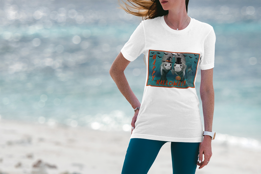 Happy Halloween Manatee Tee, model wearing white t-shirt on beach