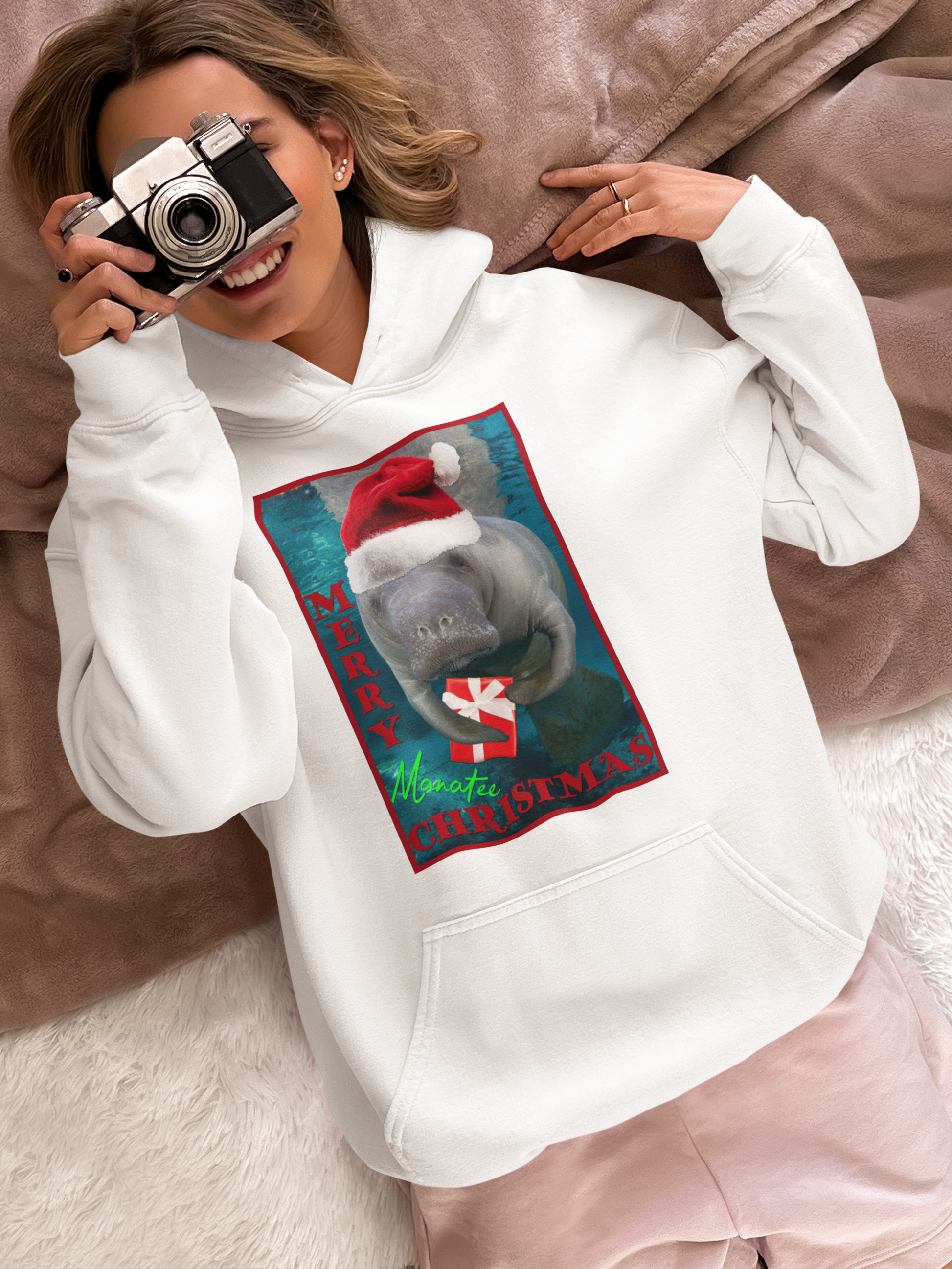 Merry Christmas Manatee Hoodie, model with camera