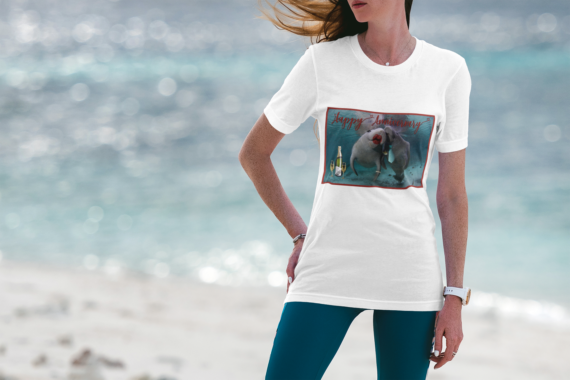 Happy Anniversary Manatee Tee, model wearing t-shirt on beach