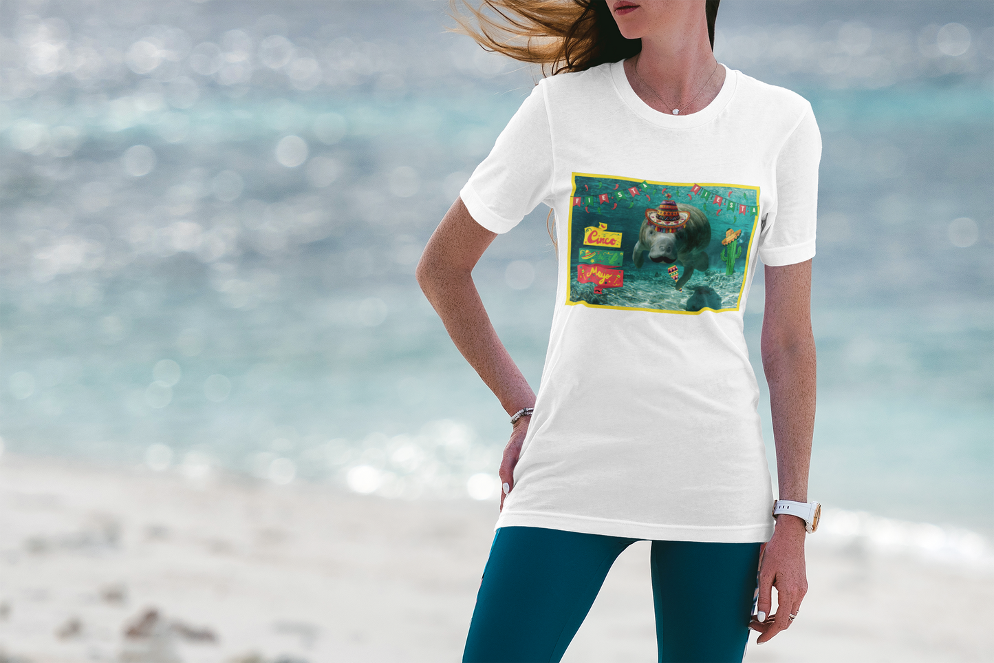 Happy Cinco de Mayo Manatee Tee, model wearing whit t-shirt on beach