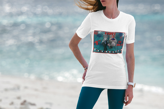 Happy 4th of July Manatee Tee, model wearing white t-shirt on beach