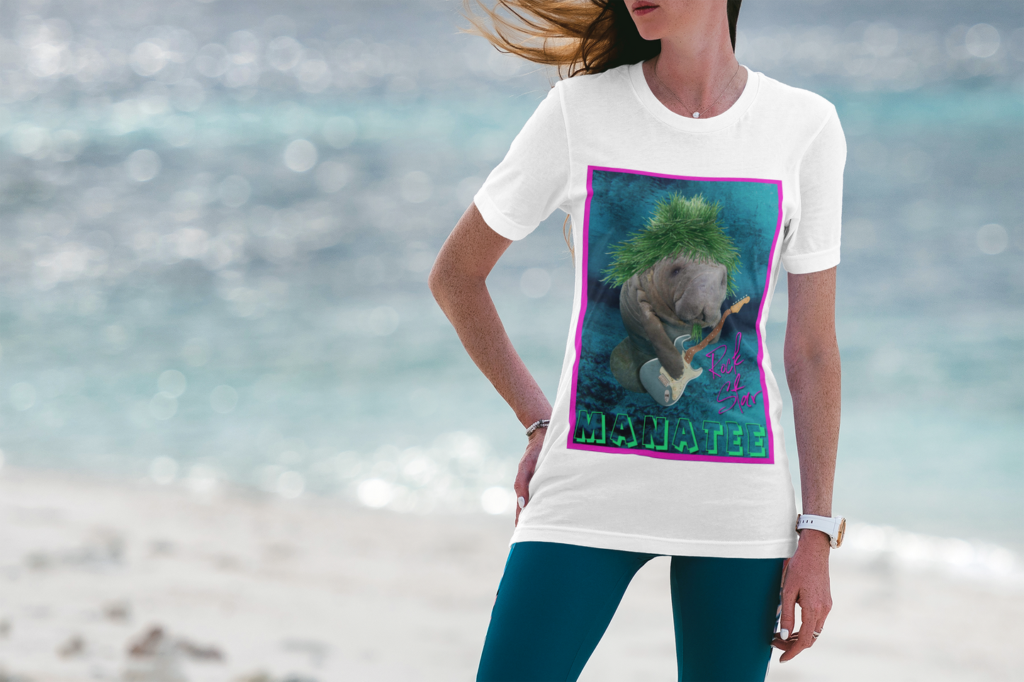 Rock Star Manatee Tee, model wearing white t-shirt on beach