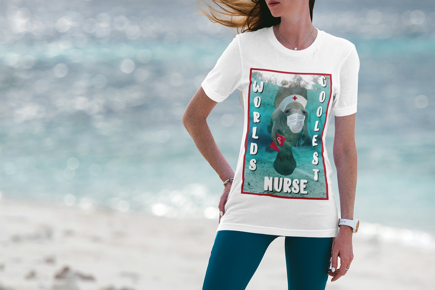 World's Coolest Nurse Manatee Tee, model wearing white t-shirt on beach