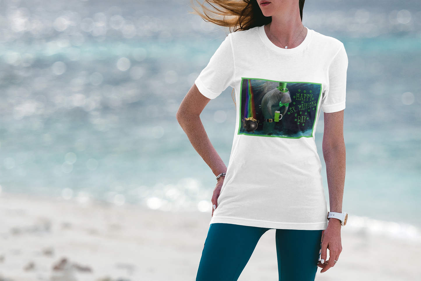 Happy St Patrick's Day Manatee Tee, model wearing white t-shirt on beach
