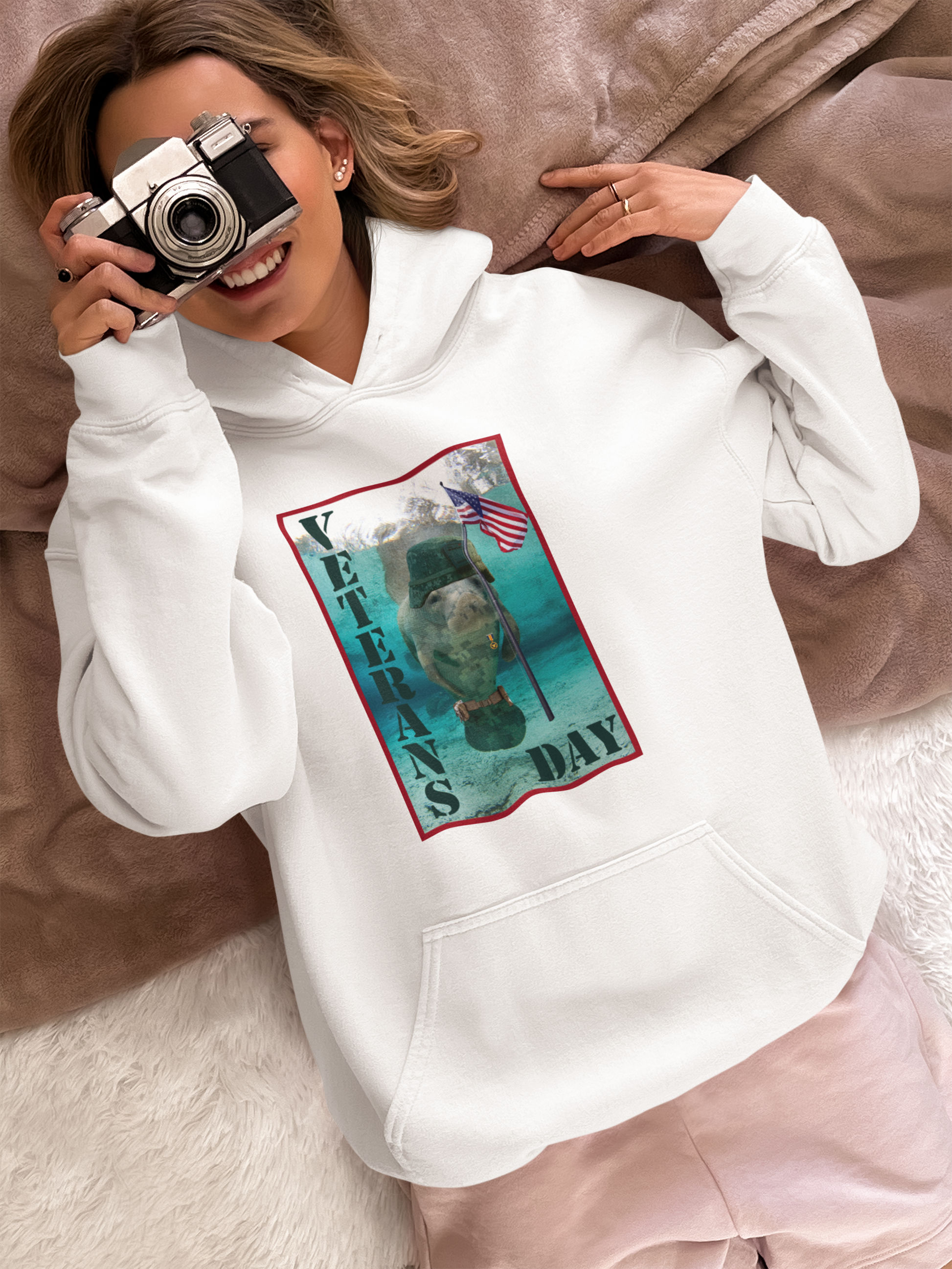 Veterans Day Manatee Hoodie, model with camera