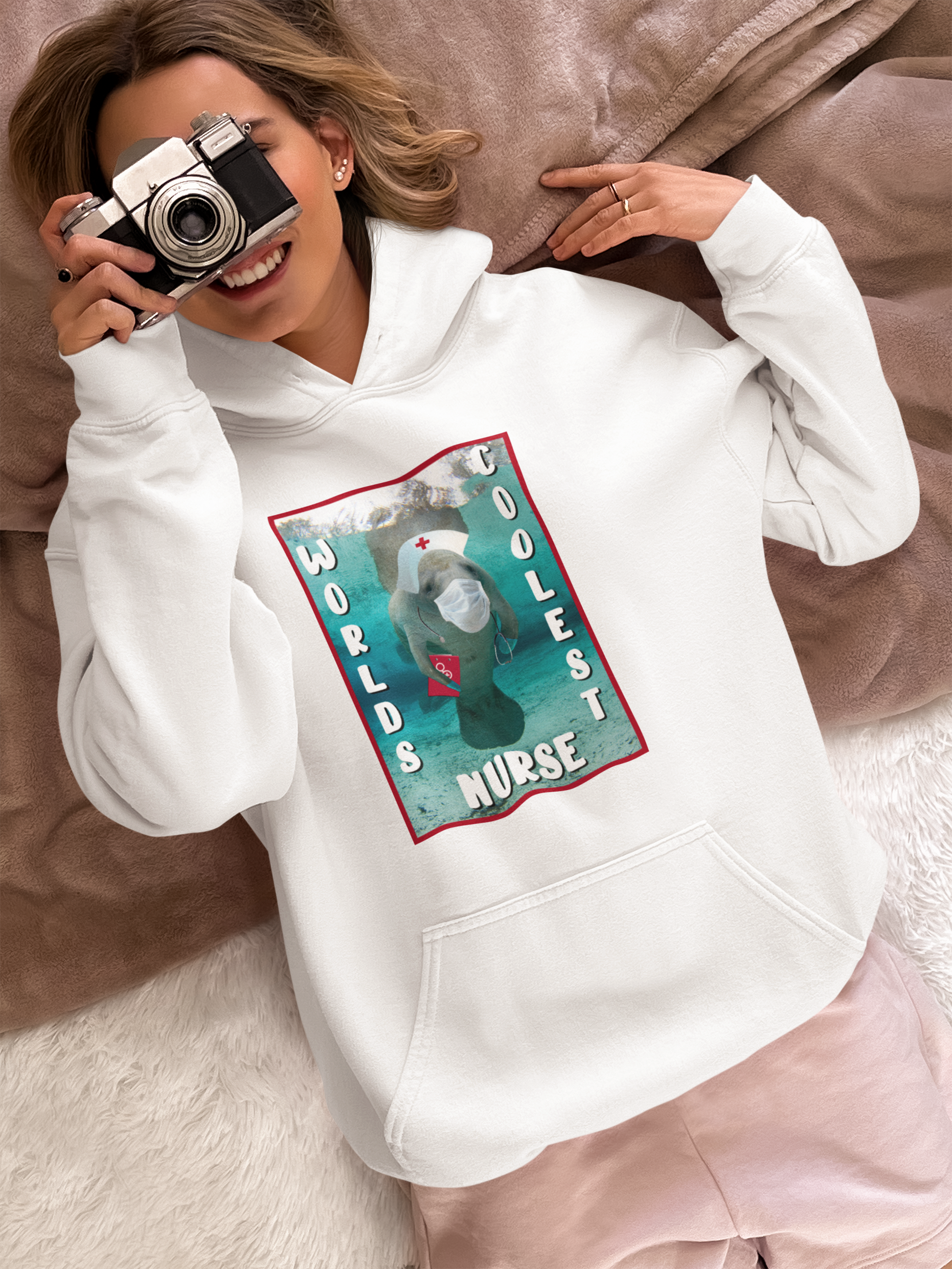 World's Coolest Nurse Manatee Hoodie, model with camera